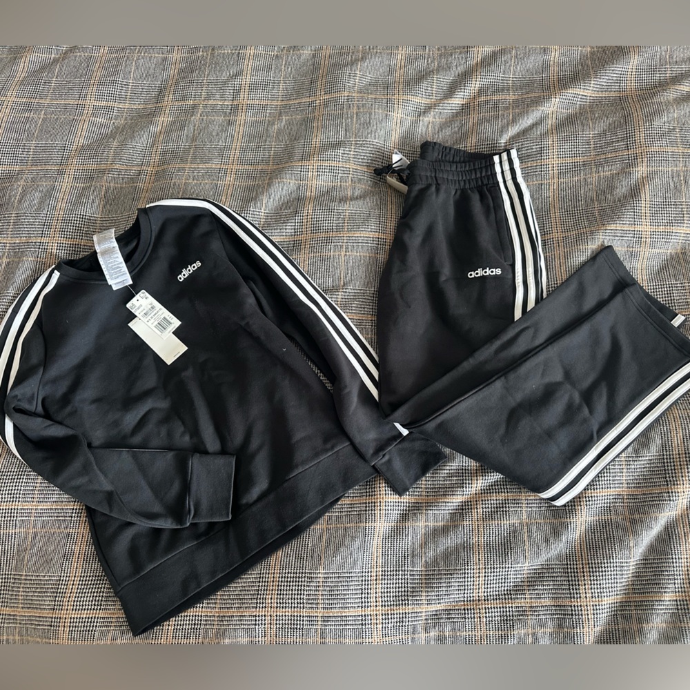 NWT women’s adidas sweatsuit.